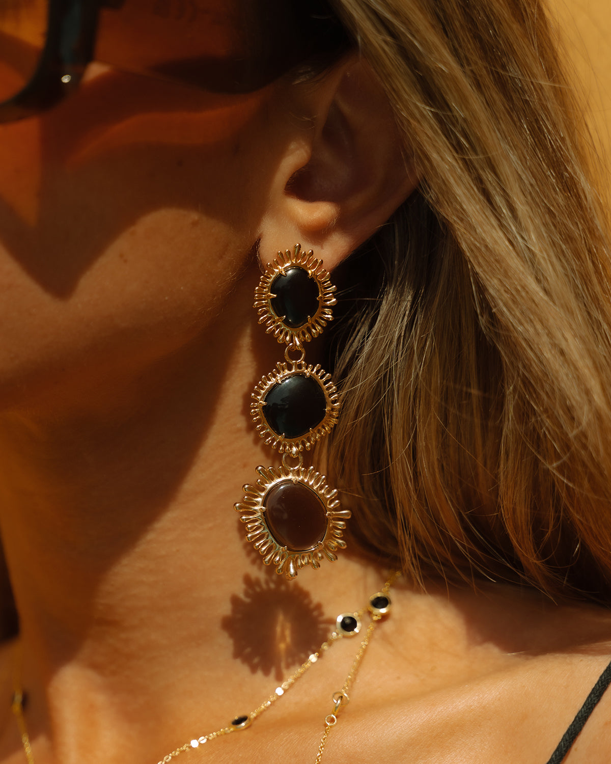 Sun pendants with onyx