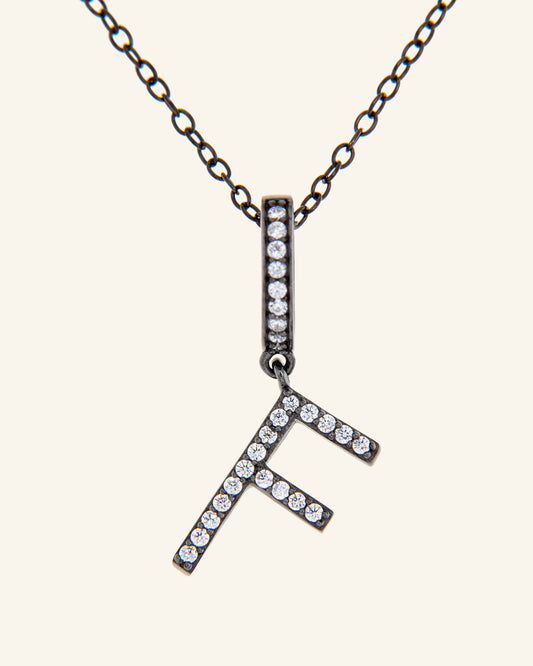 Roma Letter F necklace in ruthenium and zircons 