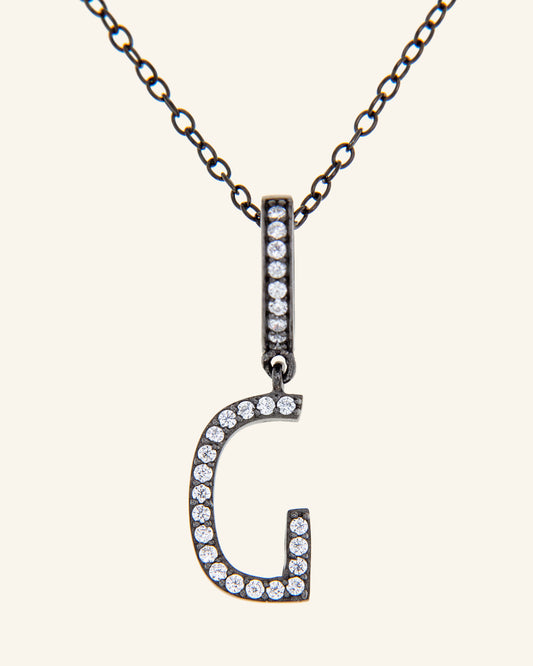 Roma Letter G necklace in ruthenium and zircons 