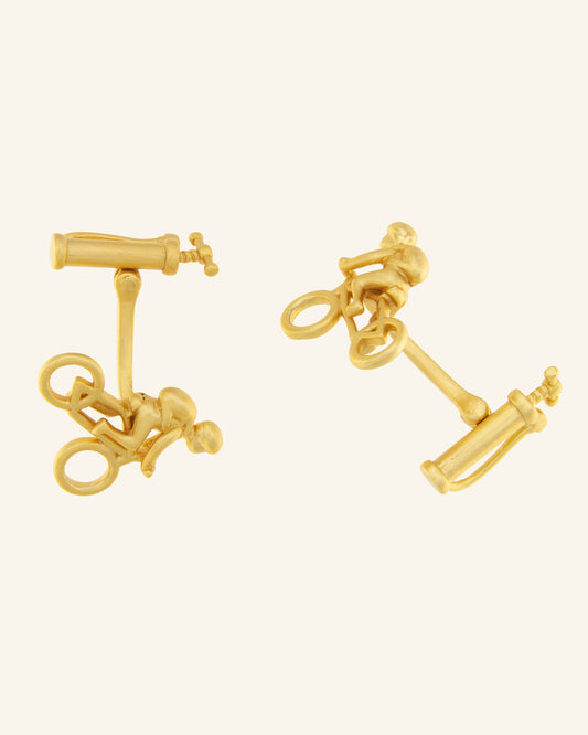Matte gold cyclist cufflinks