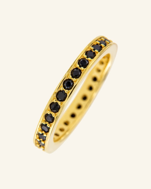 Anillo Tiber dorado con circonitas negras