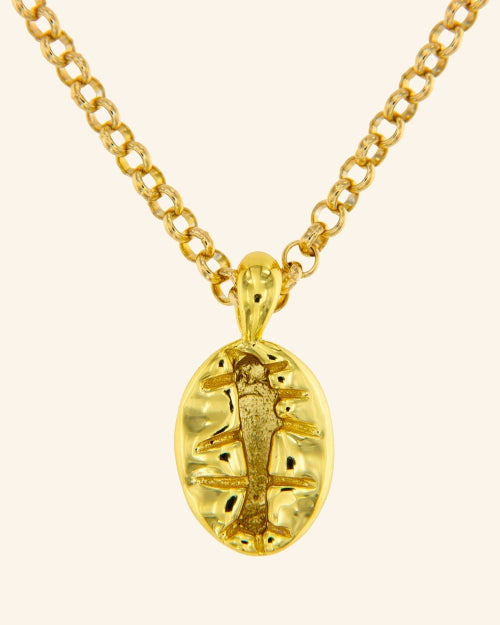 Two Gold Seeds Pendant